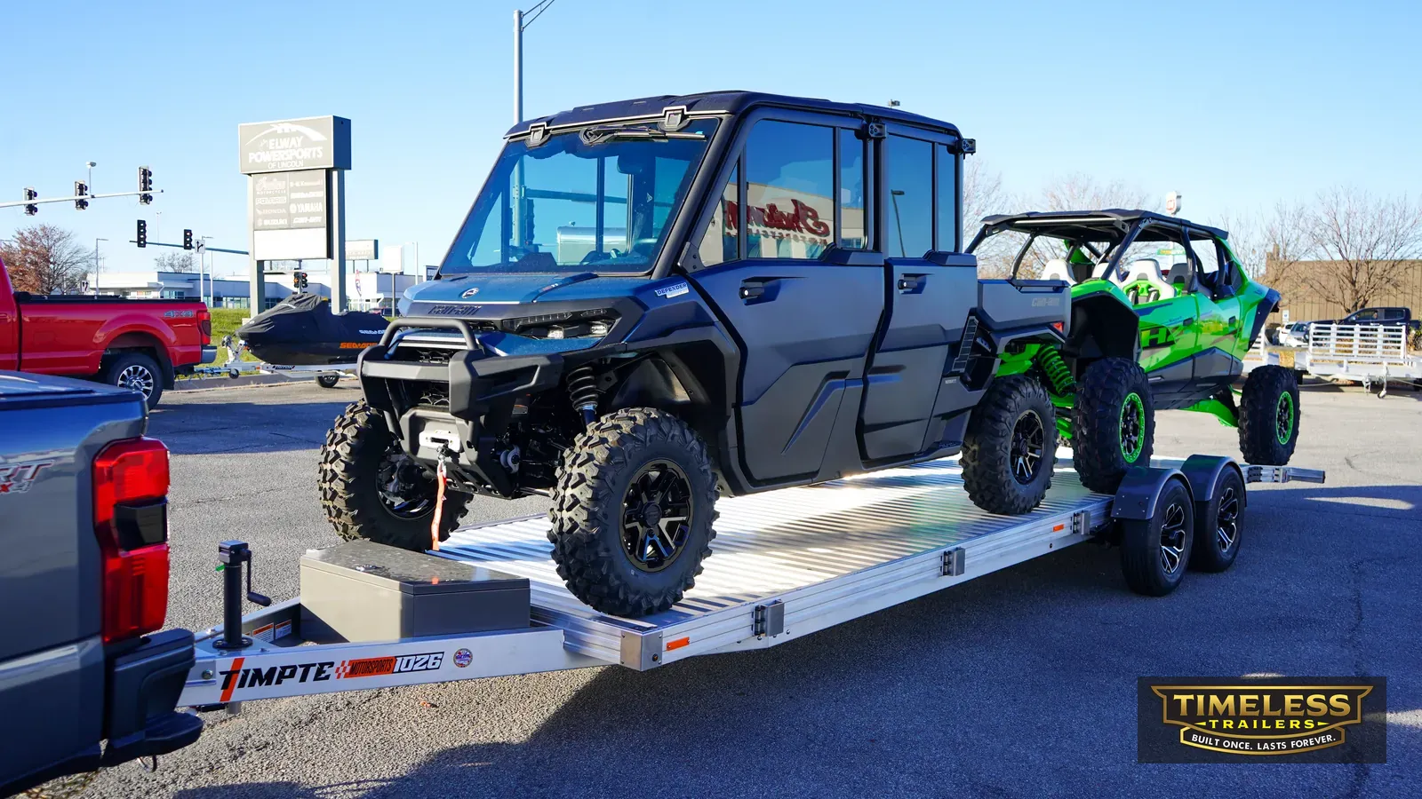 Timpte 1026 EZ Load carrying a crew-cab UTV and a sport side-by-side, side view