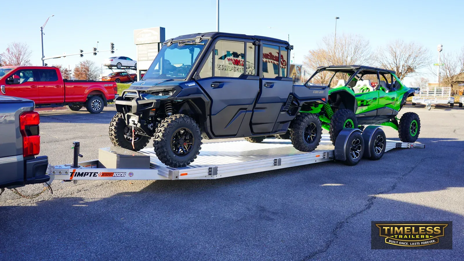 Timpte 1026 EZ Load carrying a crew-cab UTV and a sport side-by-side, rear view