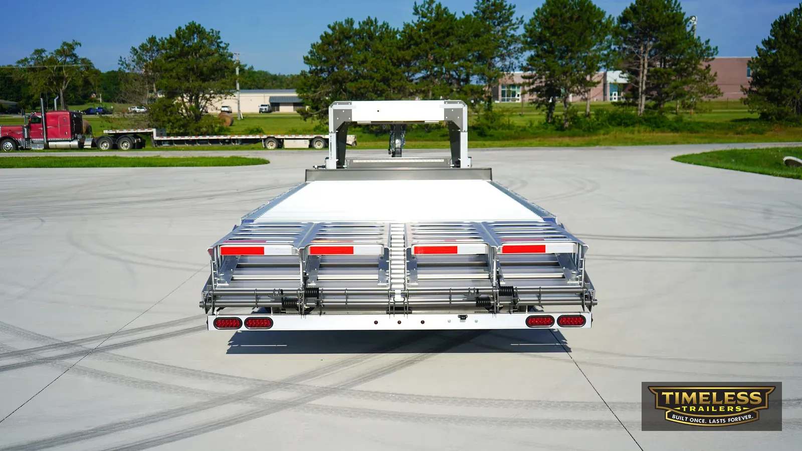 Timpte 1620 Gooseneck from the rear with the ramps folded up and tail lights