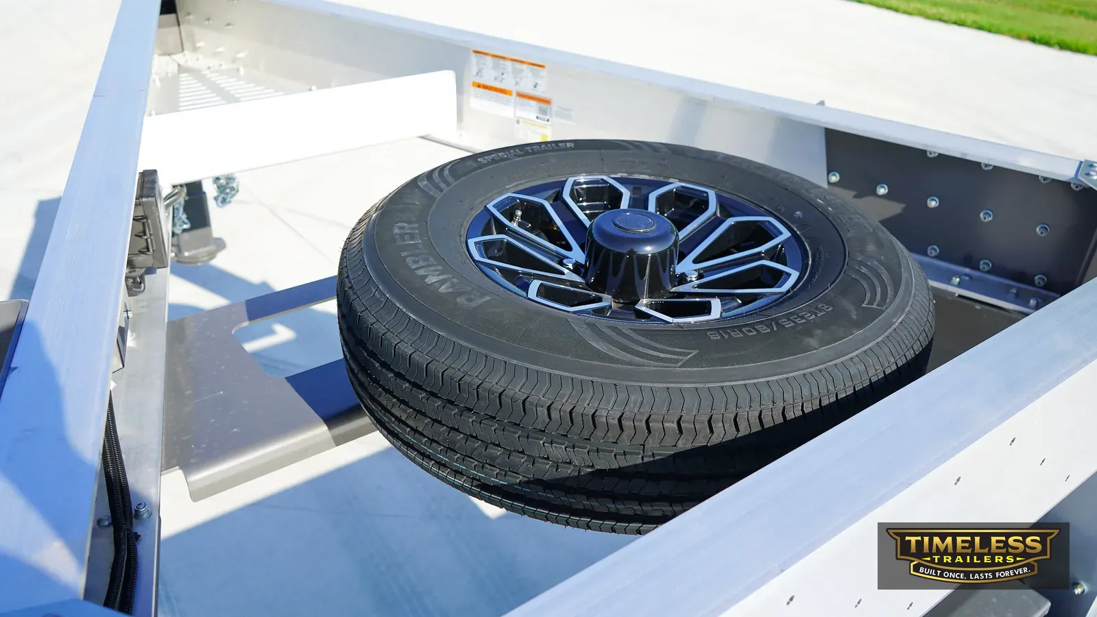 Spare tire mounted under the deck of the Timpte 1620 Gooseneck