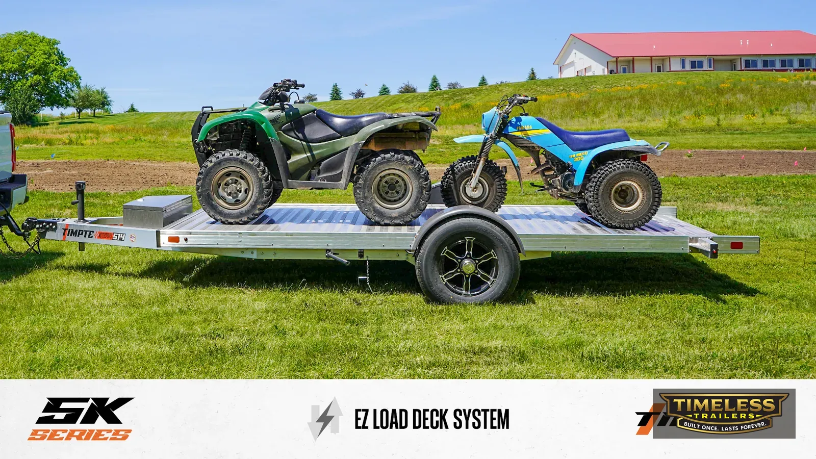Timpte 514 EZ Load with two ATVs and a three-wheeler on the deck