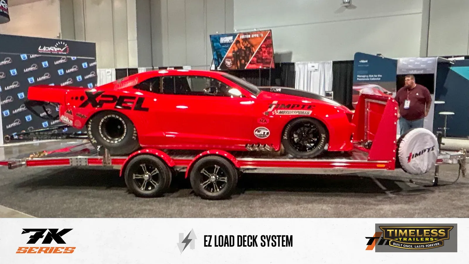 Timpte 720 EZ Load with a red sports car on display at a show