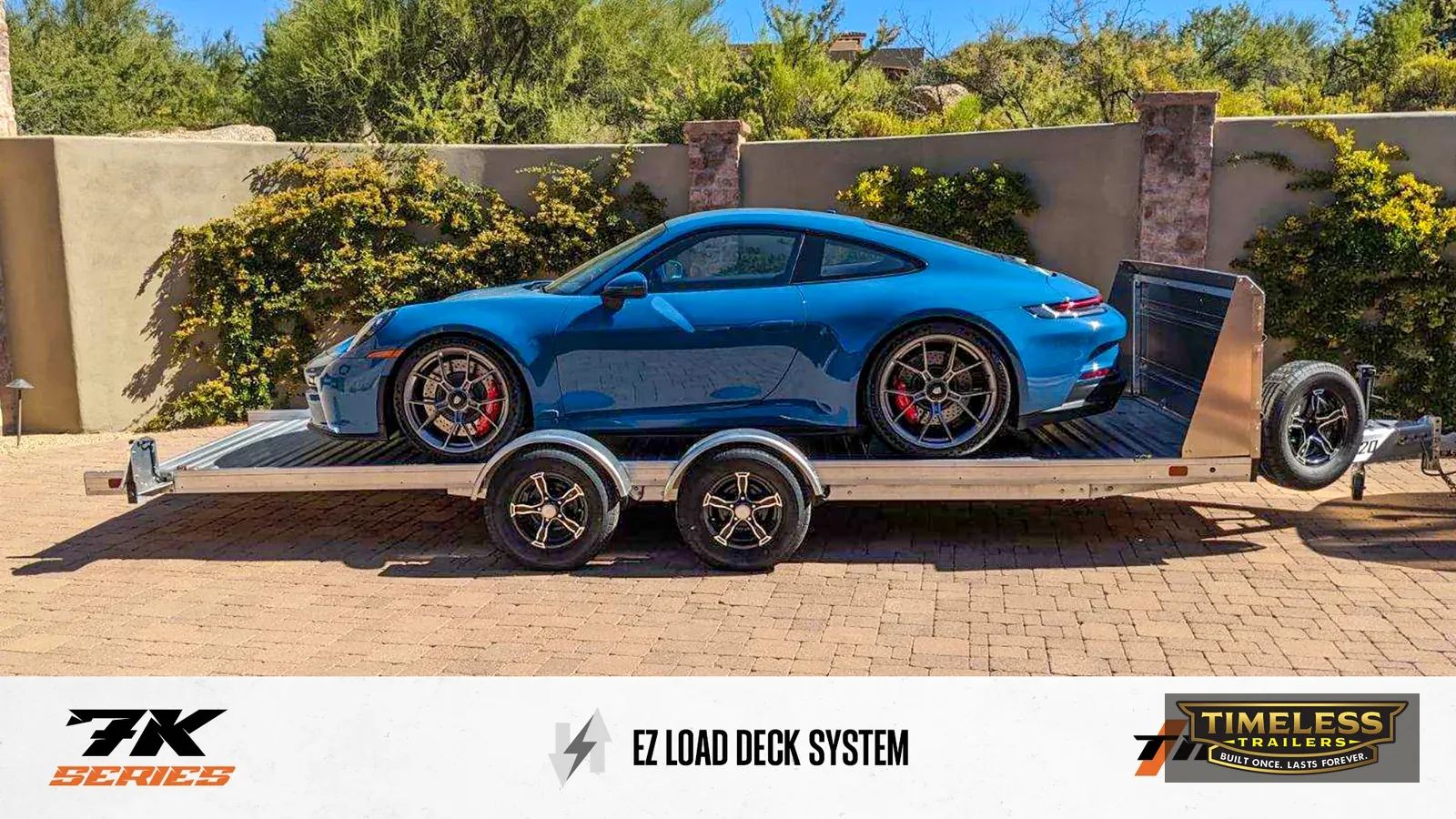 Timpte 720 EZ Load carrying a blue sports car